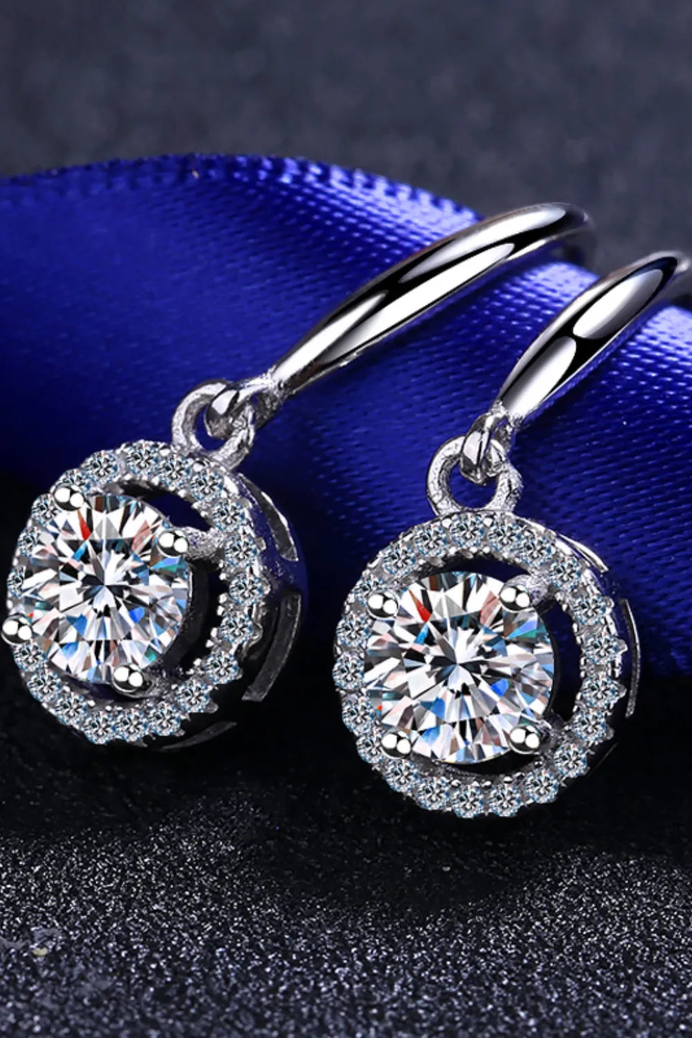 Elegant 1 carat moissanite drop earrings with sparkling halo design, perfect for special occasions