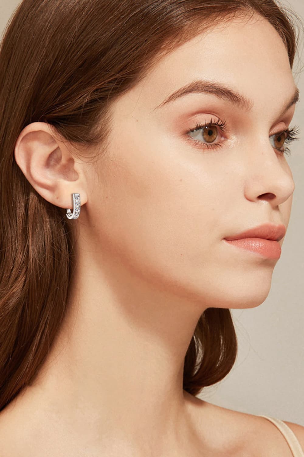 Stylish 1 Carat Moissanite Earrings displayed on a model, highlighting their elegant design