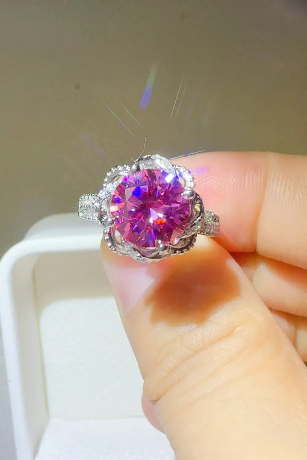 Trendsi 2 carat moissanite flower ring featuring a pink stone with intricate silver details.