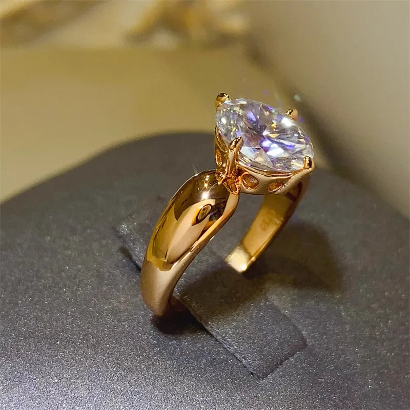 Elegant 2 carat moissanite ring in a rose gold setting with a sparkling pear-shaped stone