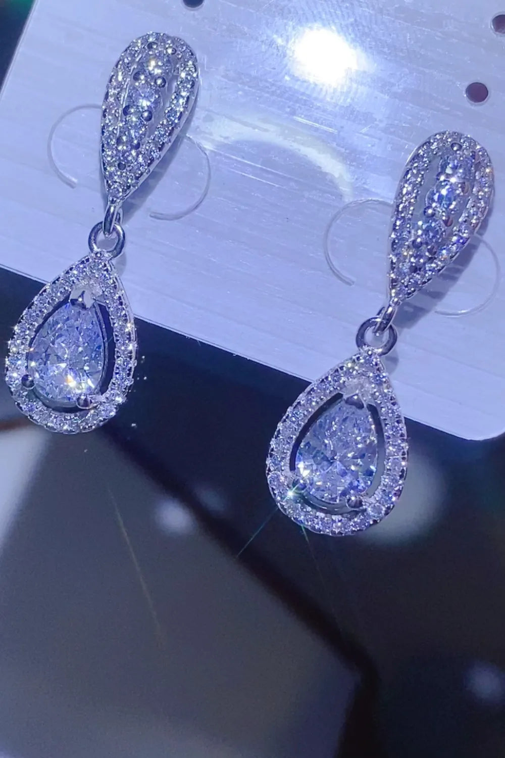 Elegant 2 carat teardrop earrings with sparkling details, perfect for special occasions