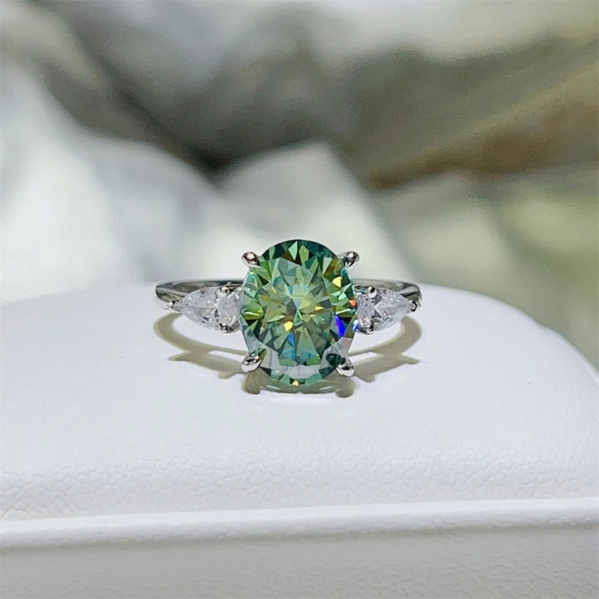 Trendsi 3 carat moissanite ring with an oval-cut center stone and side accents for a dazzling look