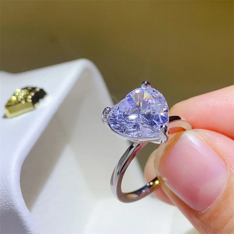 5 carat heart shape moissanite ring with a brilliant sparkle, set in a sleek silver band