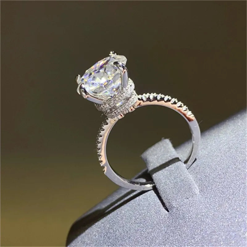 Elegant 5 carat moissanite ring set in silver with sparkling accents for engagement or special occasions