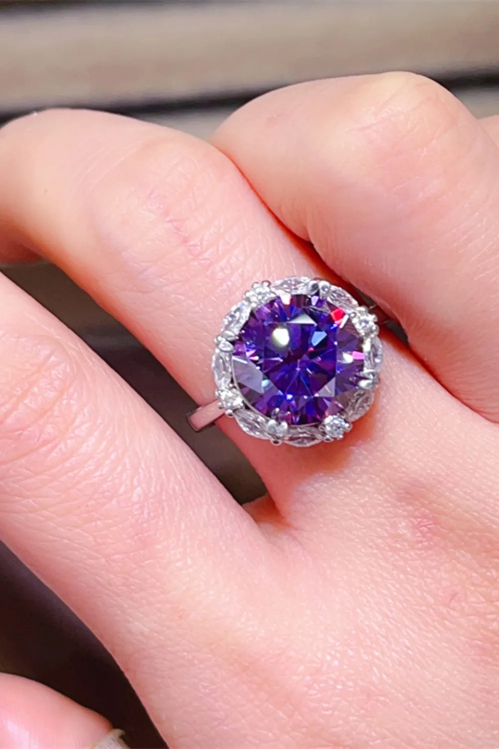 Stunning 5 carat moissanite ring with a radiant purple stone and sparkling accents