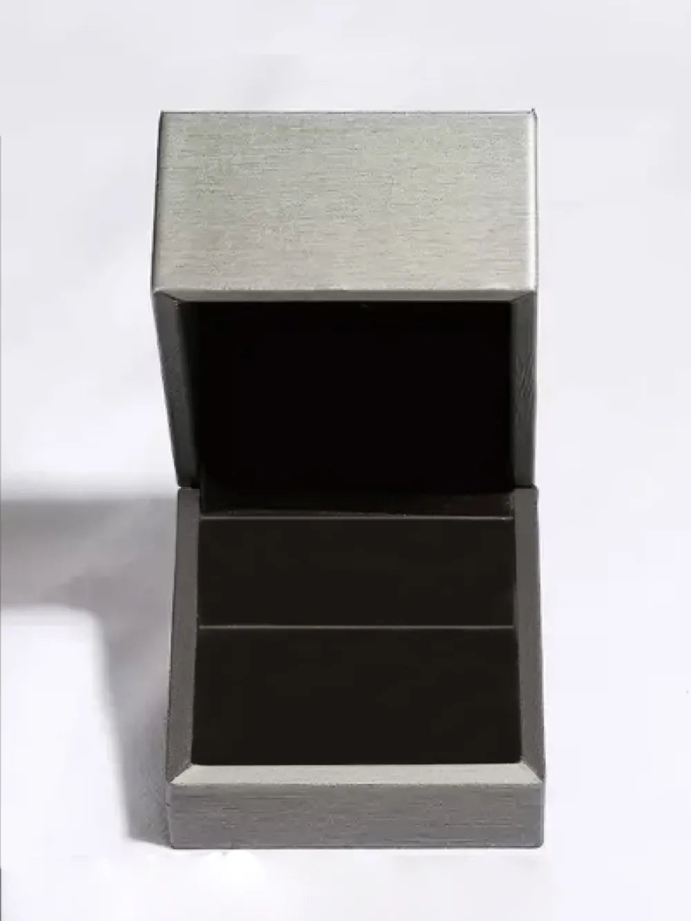 Elegant open jewelry box for displaying 925 sterling silver heart earrings with a sleek design