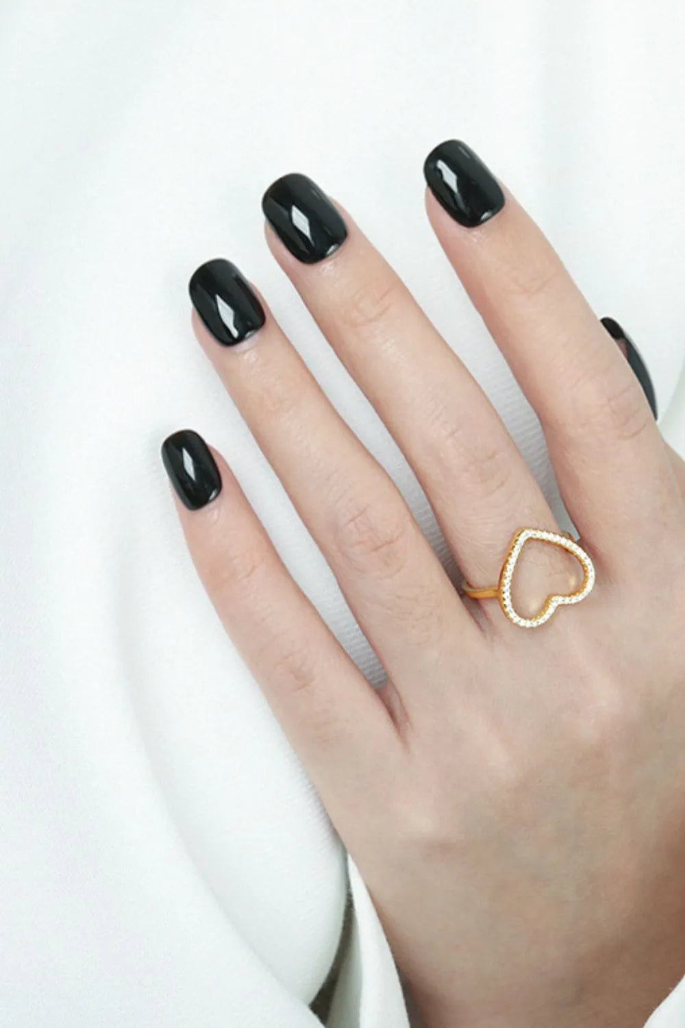 Trendsi 925 sterling silver heart ring shown on model's hand with black nail polish