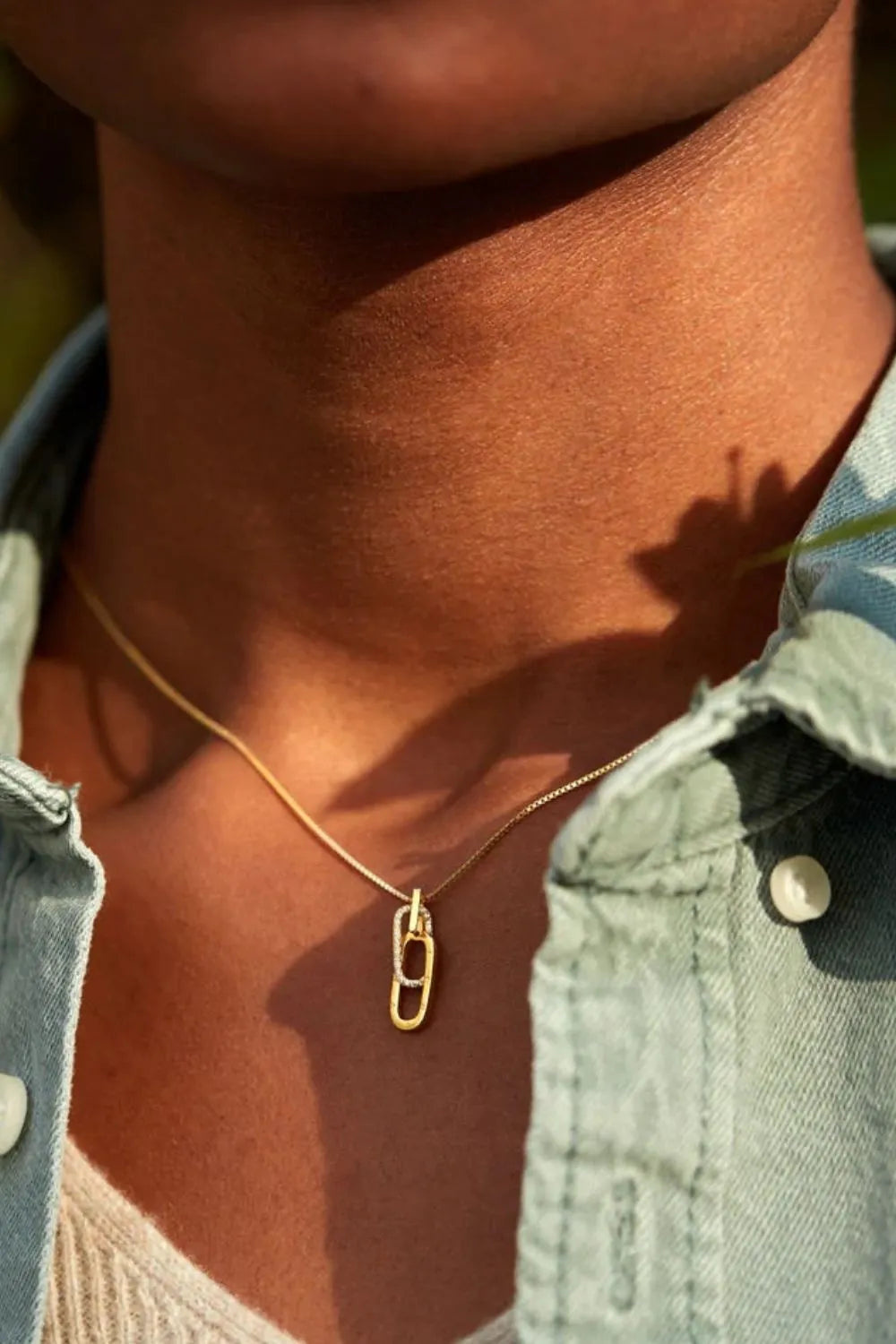 Trendsi 925 sterling silver necklace featuring a stylish gold safety pin design on a delicate chain