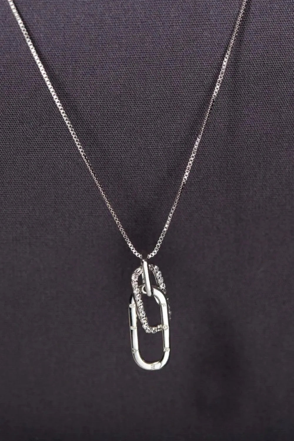 Trendsi 925 sterling silver necklace featuring a unique carabiner design with detailed chain accents