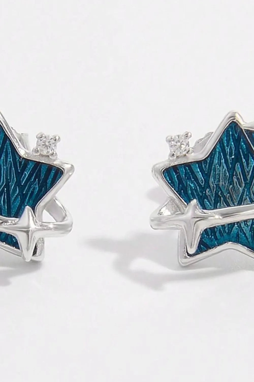 Trendsi 925 sterling silver star earrings with vibrant blue detailing and sparkling accents