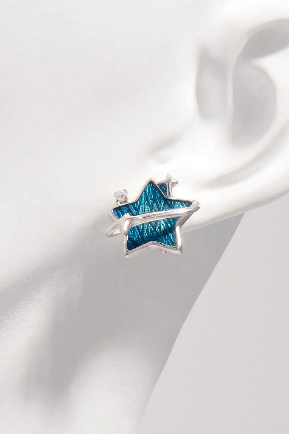 Trendsi 925 sterling silver star earrings with vibrant blue detailing and a stylish design