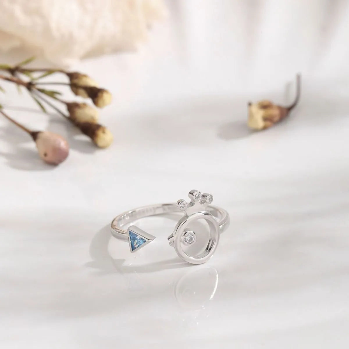 Trendy 925 sterling silver zircon ring featuring a blue triangle and sparkling accents