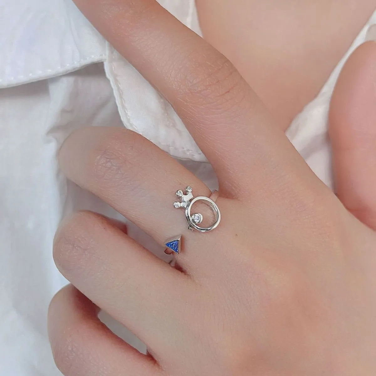 Fashionable 925 sterling silver zircon ring featuring a unique design with triangle and round stones