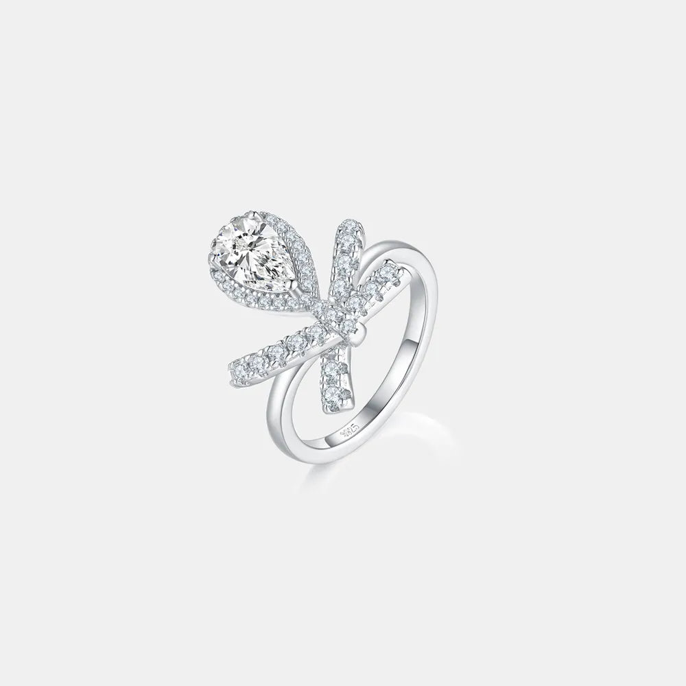 Stylish affordable moissanite rings featuring a tear drop design and sparkling detailing