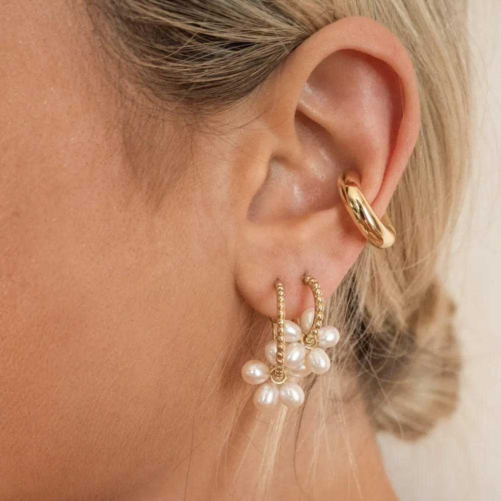 Trendy clip on earrings for women featuring gold and pearl accents for elegant style