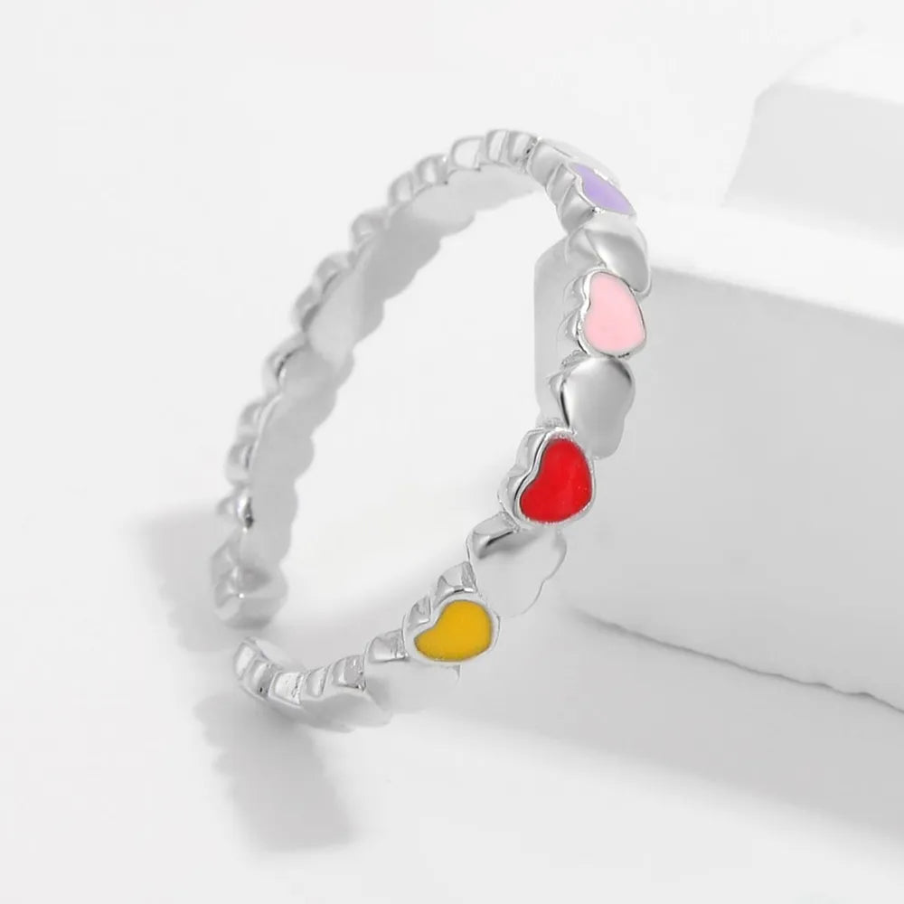 Colorful heart ring for women featuring multiple heart-shaped accents in vibrant colors