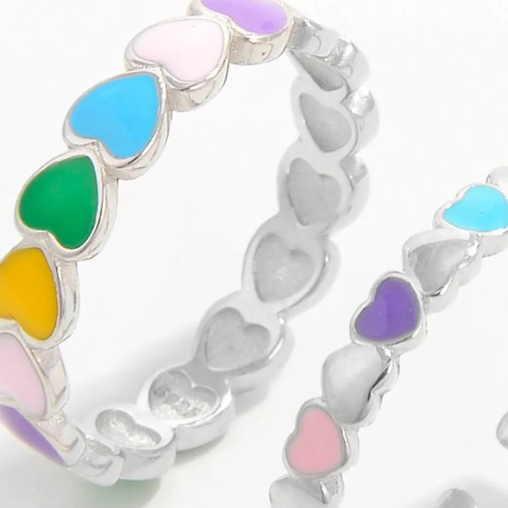 Colorful heart ring for women featuring multiple heart designs in vibrant colors and a silver band