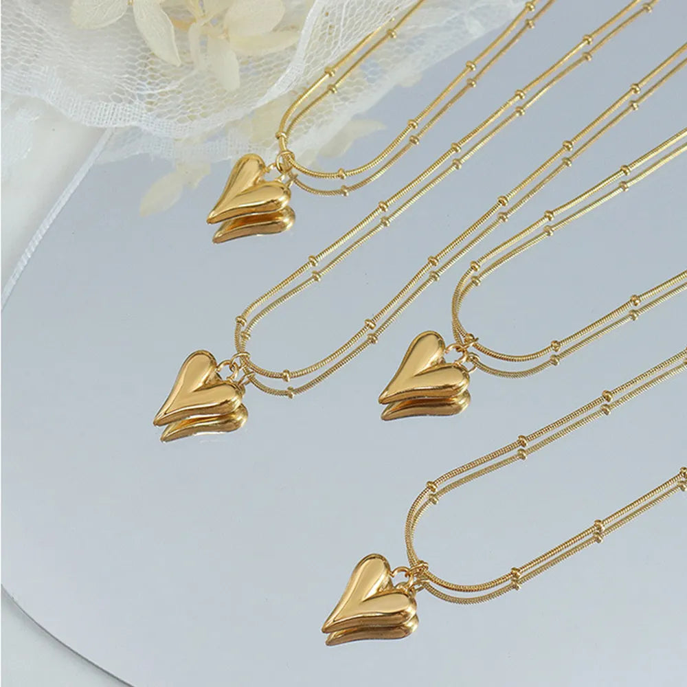Trendsi durable heart pendant necklace featured in elegant gold with a unique design
