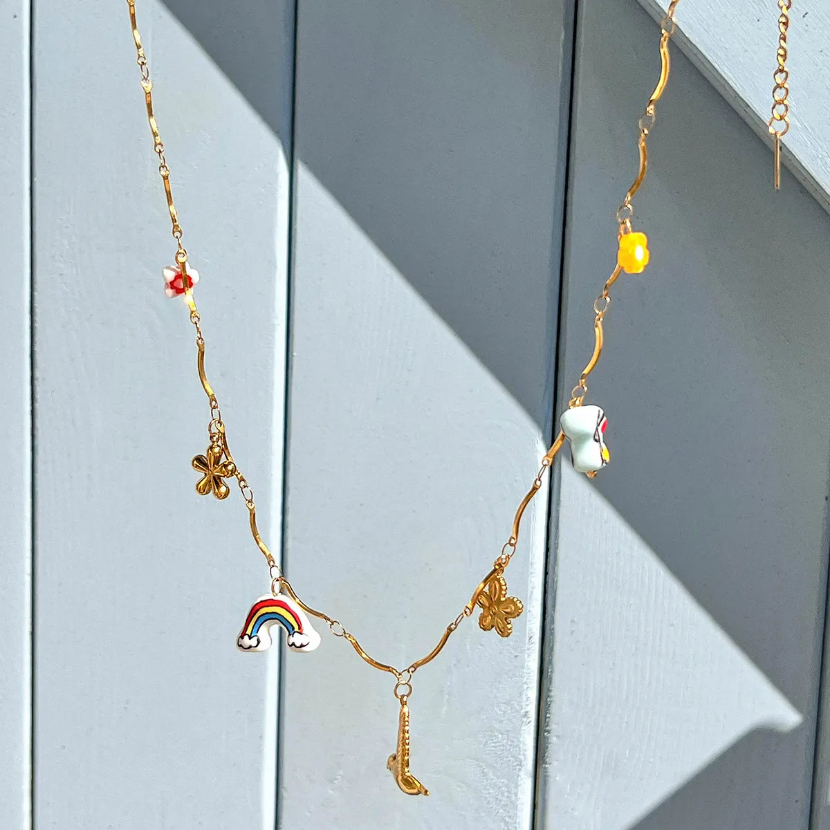 Trendsi elegant gold pendant necklace with colorful charms including rainbow and flowers