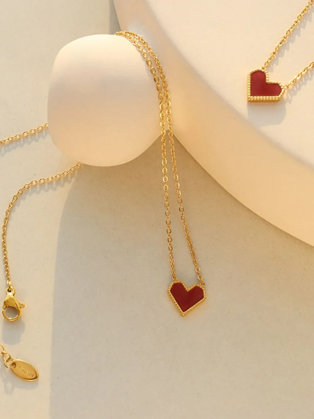 Trendsi Elegant Heart Jewelry featuring Gold Chain with Red Heart Pendants for Stylish Accessories