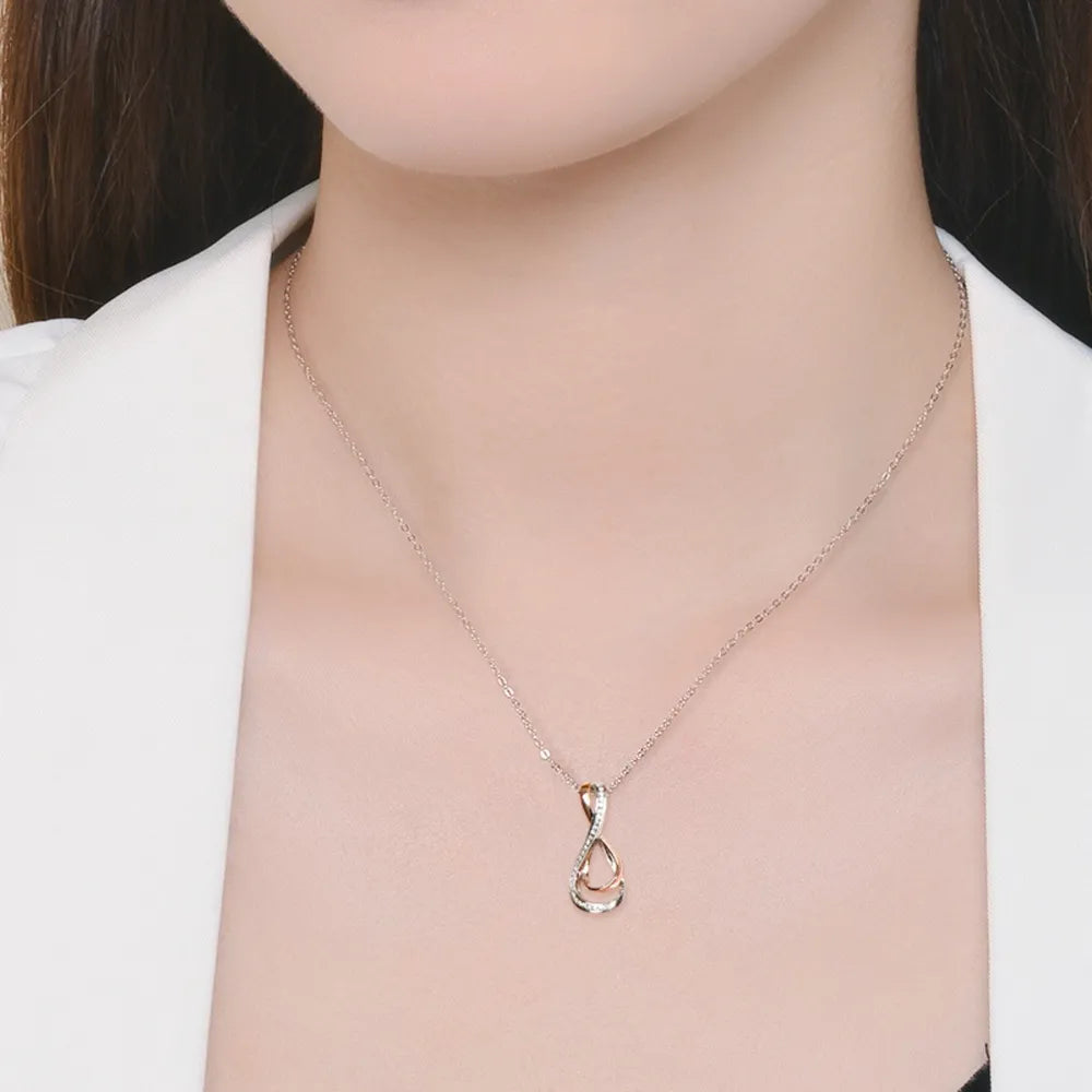 Trendsi elegant infinity necklace for women in silver with a delicate chain and a stylish pendant
