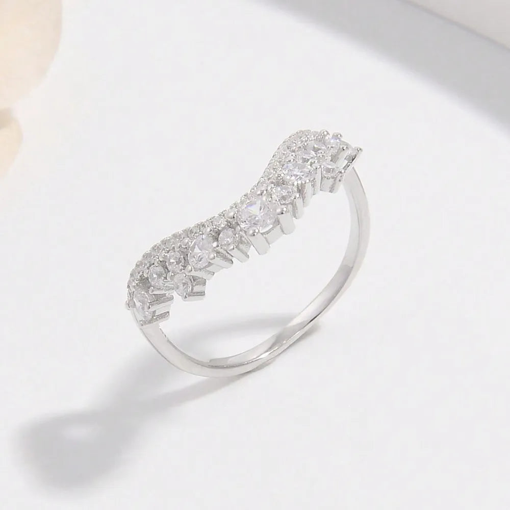 Elegant silver inlaid jewelry ring with sparkling clear stones for a sophisticated look