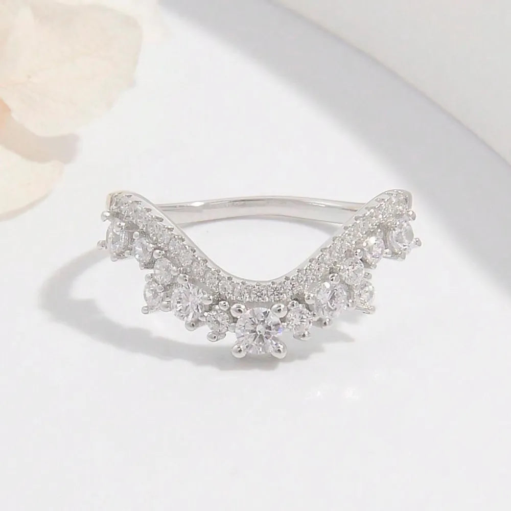 Elegant silver inlaid jewelry ring with sparkling crystals and a unique design for special occasions