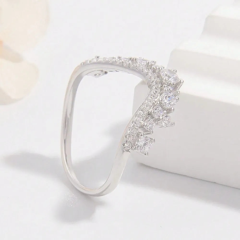 Trendsi elegant silver inlaid jewelry ring with sparkling stones and a sleek design