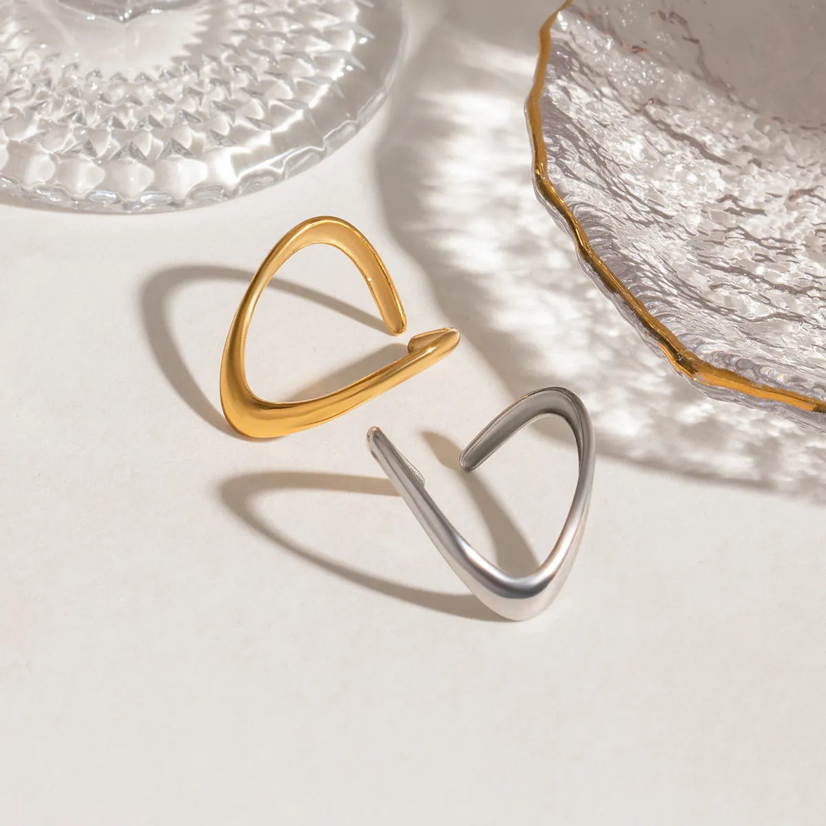 Trendsi gold and silver ring set featuring modern curved designs for trendy accessories