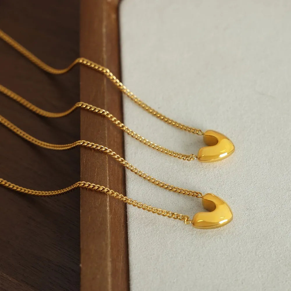 Trendsi heart pendant jewelry in gold with delicate chain for a stylish accessory