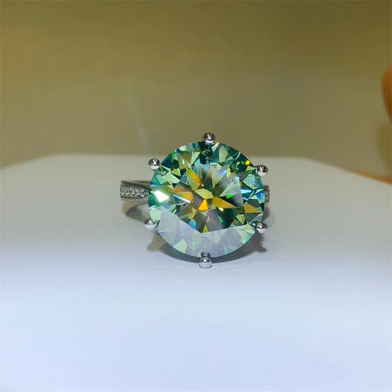 Stunning 10 carat moissanite ring with a brilliant cut and vibrant green hues