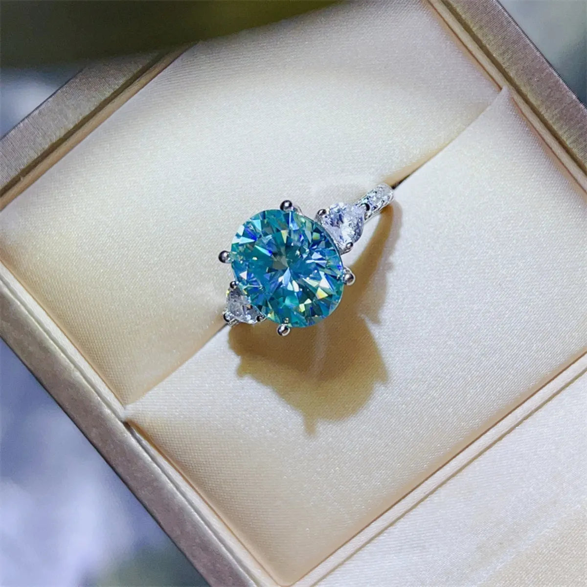Stunning 5 Carat Moissanite Ring in a luxurious display box with a sparkling oval center stone
