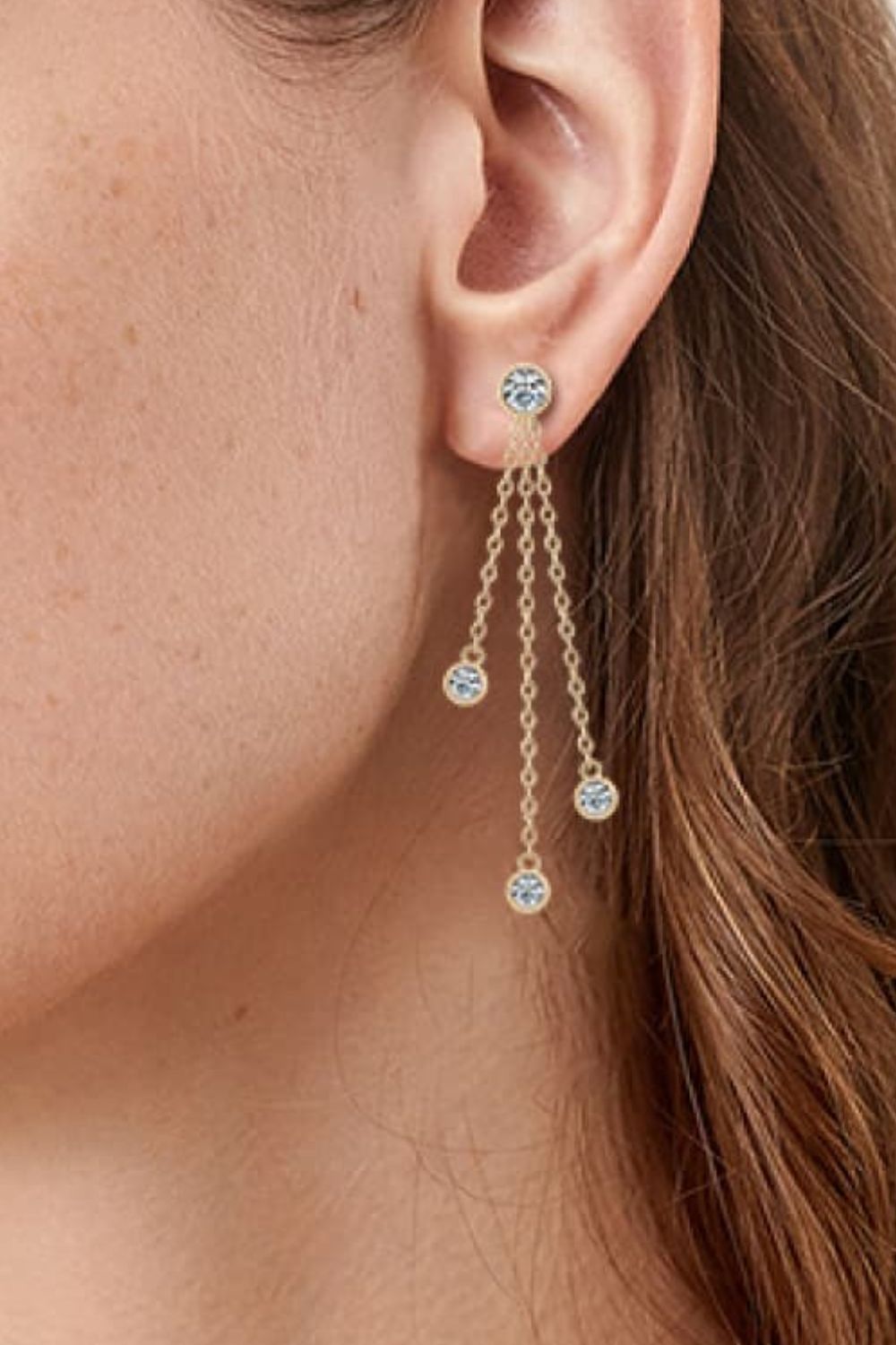 Elegant moissanite drop earrings with delicate chains and sparkling stones for a stylish look