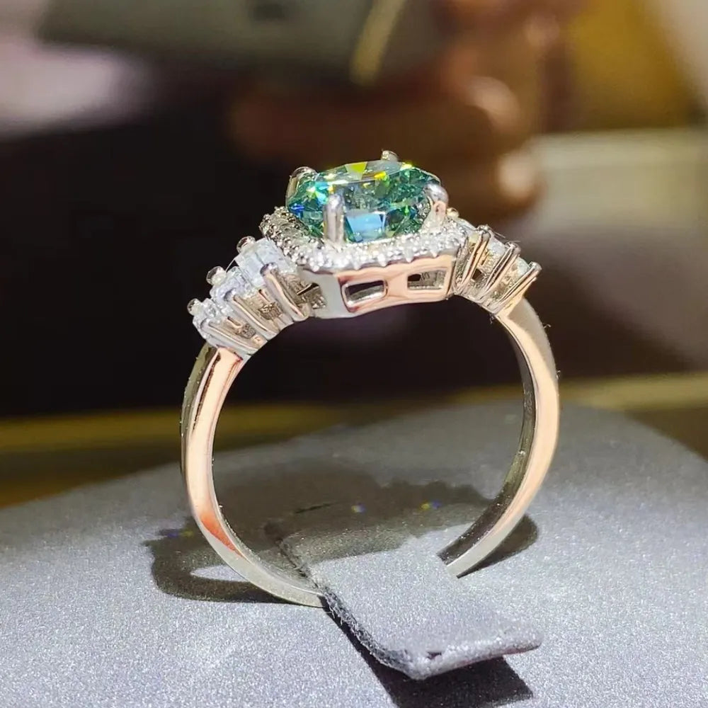 Stunning 3 carat moissanite engagement ring with a vibrant center stone and intricate band detailing