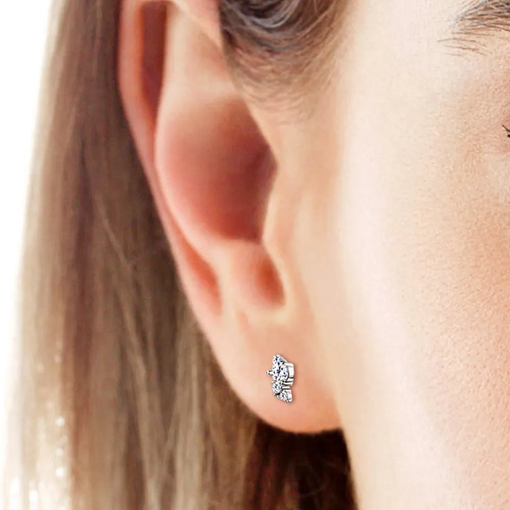 Elegant moissanite stud earrings set in silver, perfect for everyday wear and special occasions