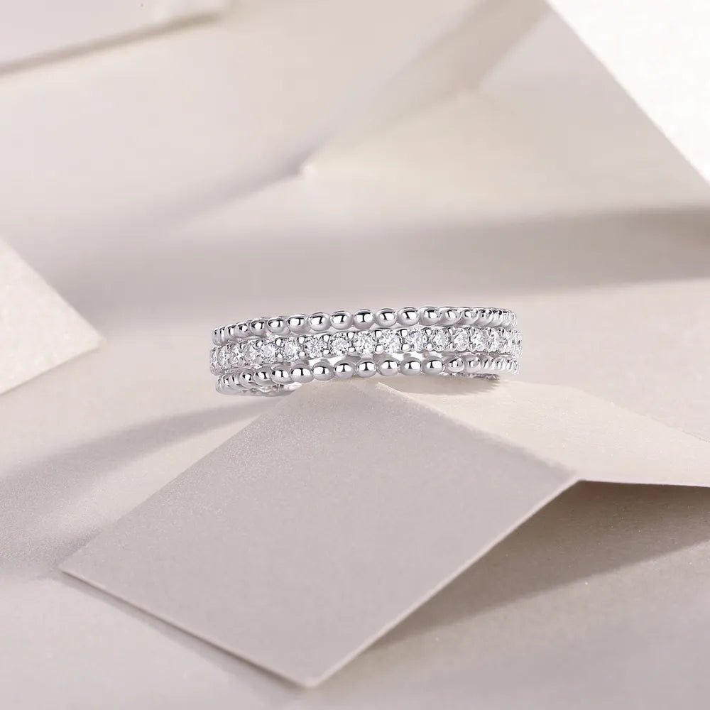 Trendsi Moissanite wedding band featuring shimmering stones in a classic design