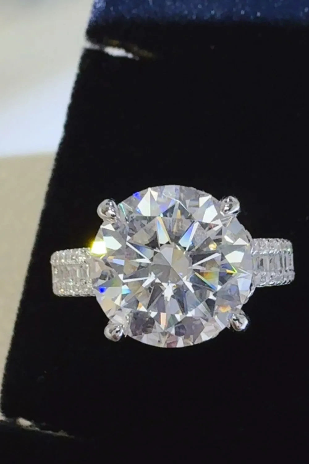 Stunning moissanite wedding jewelry ring with a brilliant round cut gemstone and sparkling band