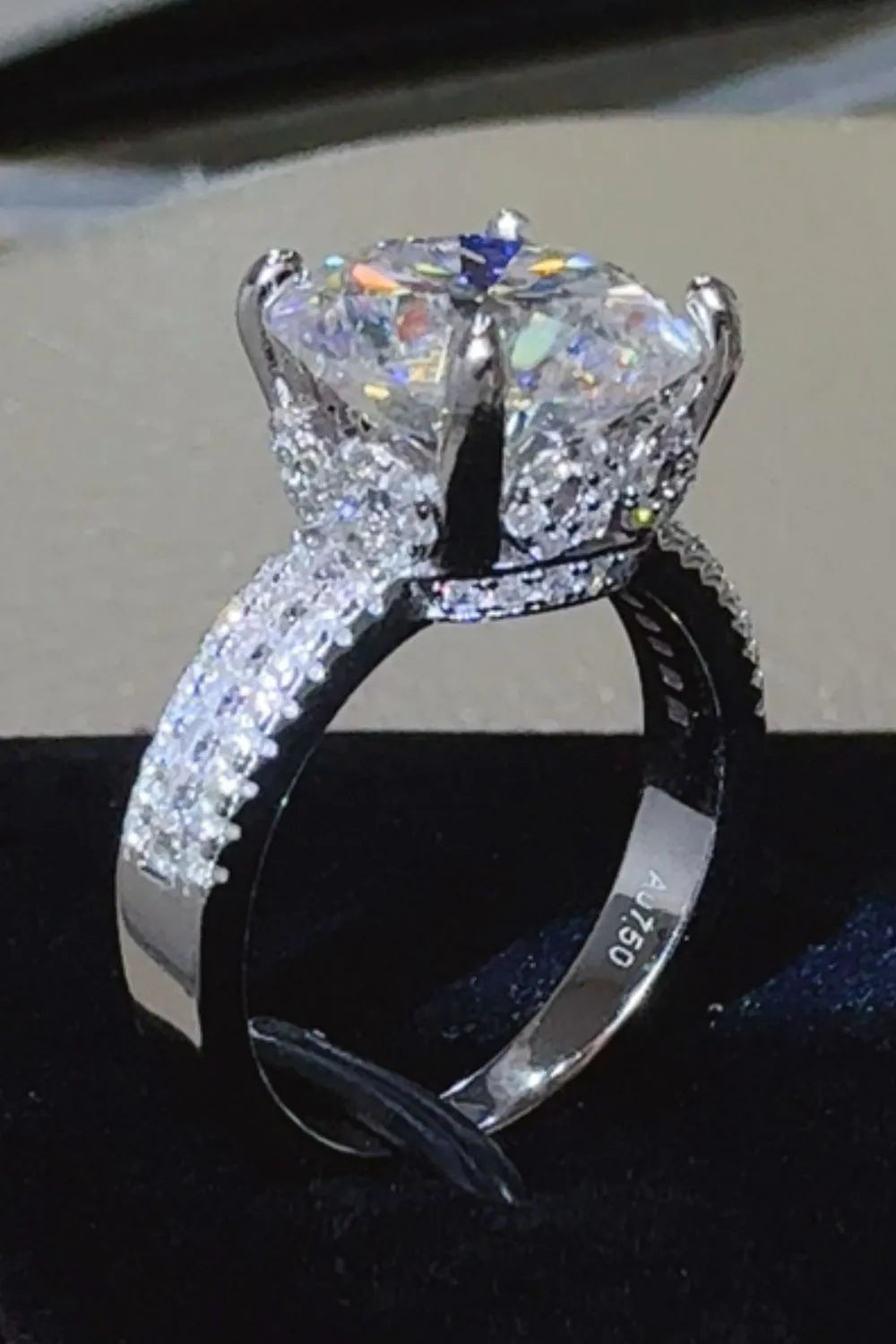 Trendsi Moissanite wedding jewelry featuring a sparkling ring with a large center stone and elegant band