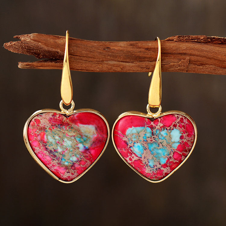 Trendy natural stone heart earrings in vibrant pink and gold for stylish additions to any outfit