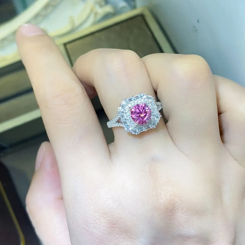 Elegant pink gemstone cocktail ring surrounded by sparkling stones, perfect for special occasions