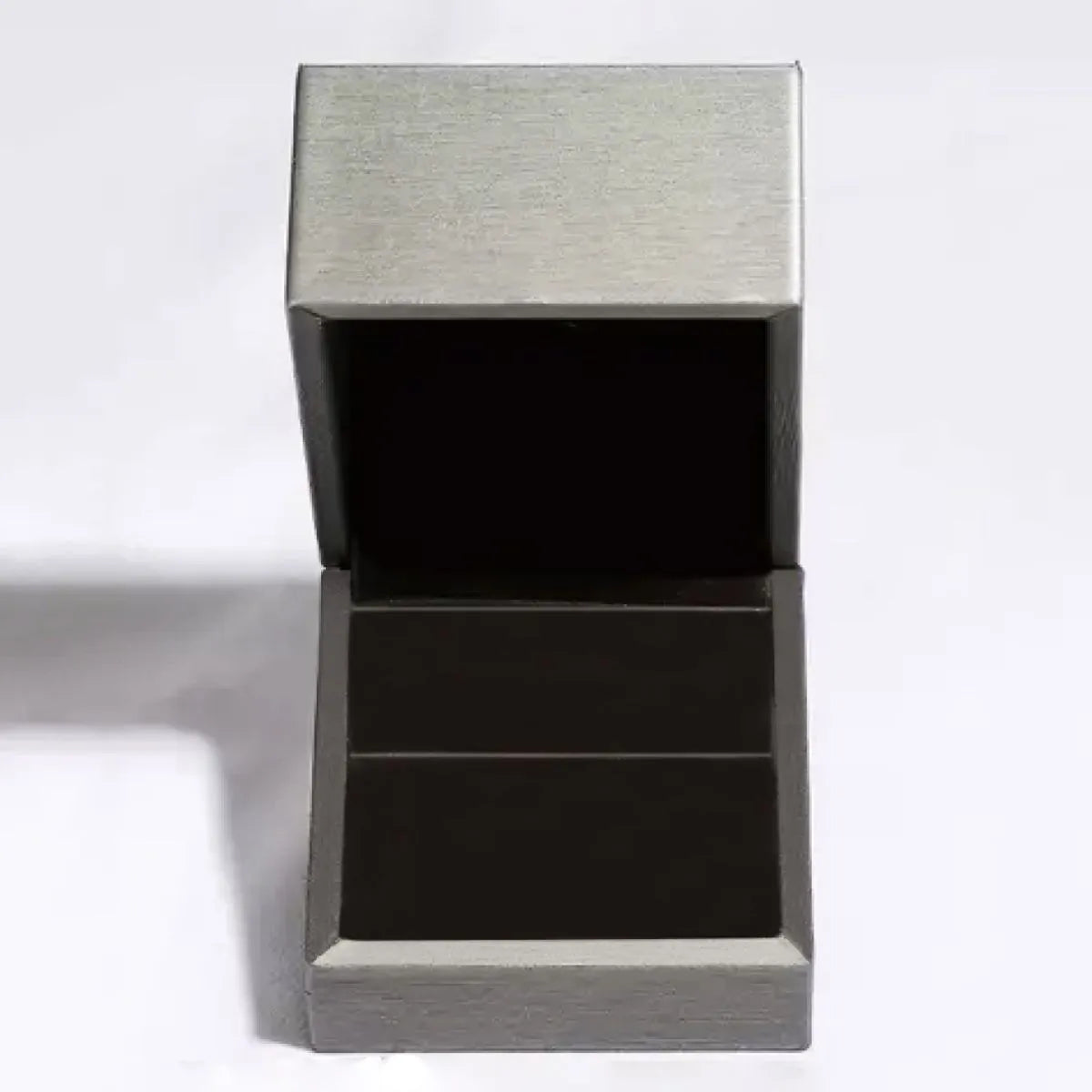 Elegant gray jewelry box for storing a yellow moissanite ring safely and stylishly