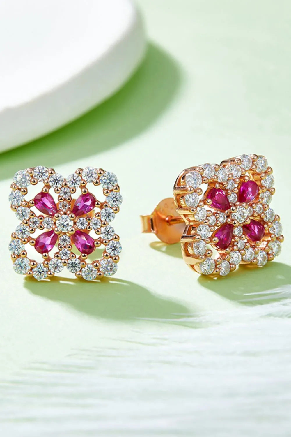 Trendsi ruby stud earrings for women featuring sparkling gemstones in a floral design