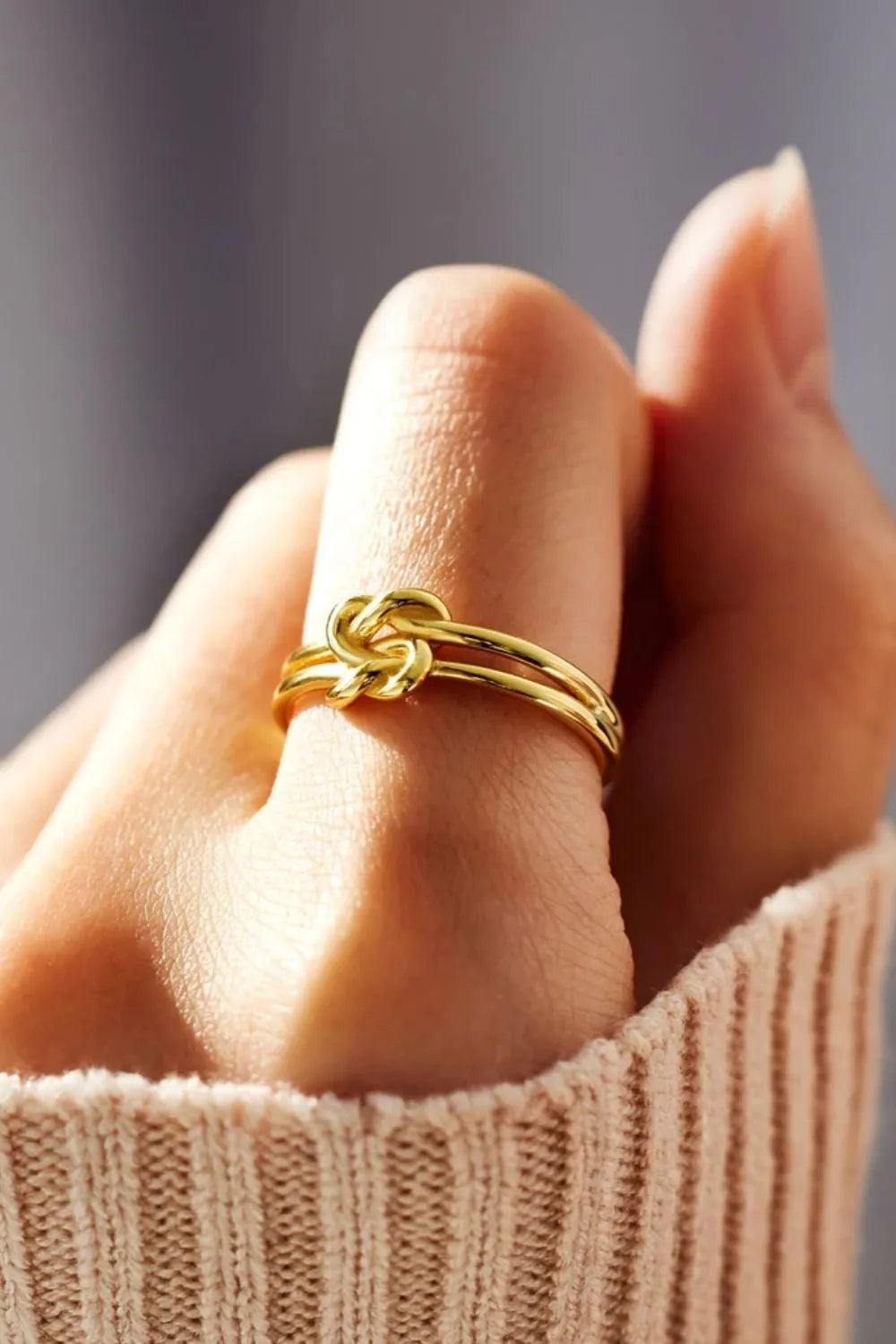 Trendsi silver knot design ring elegantly showcasing a unique intertwined pattern