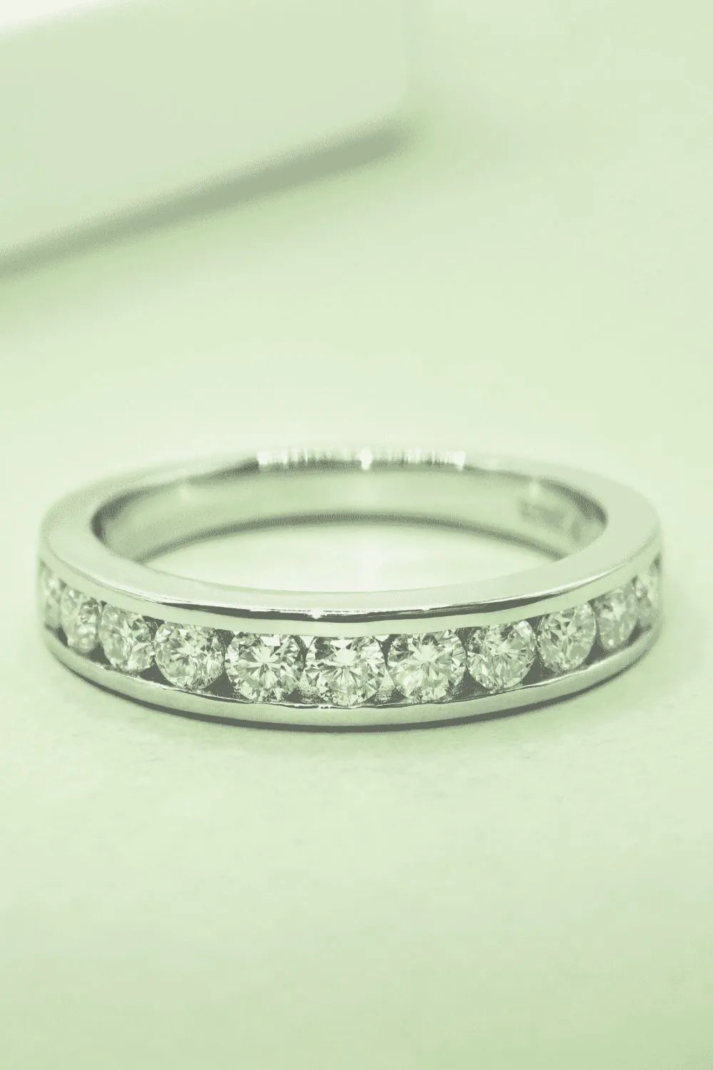 Trendsi silver moissanite wedding band featuring a sleek design and sparkling stones