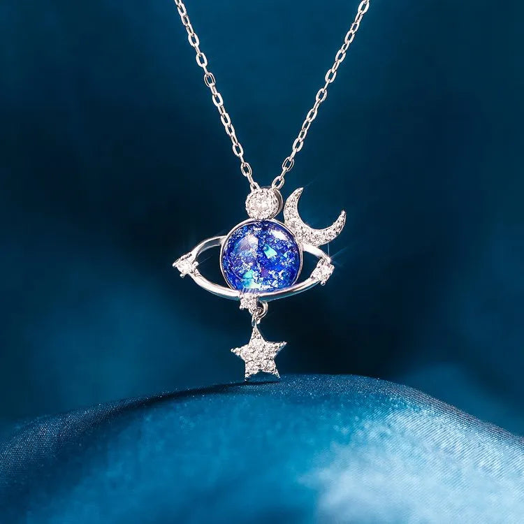Trendsi Starry Sky Necklace featuring a cosmic design with a blue gemstone and silver accents
