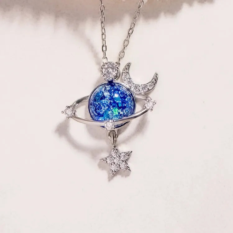 Trendsi Starry Sky Necklace featuring a blue planet, stars, and crescent moon design for a celestial look