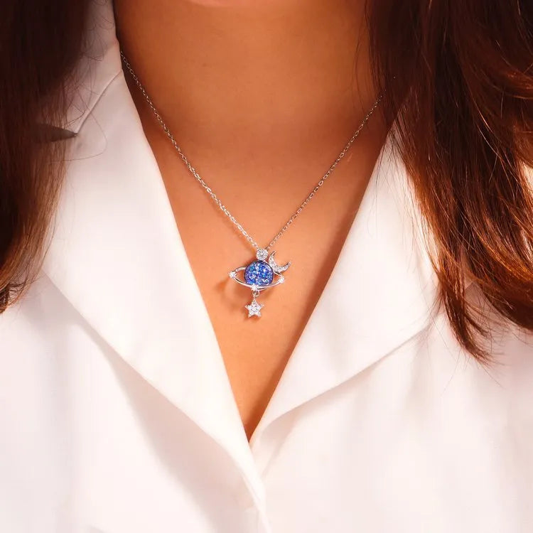 Trendsi Starry Sky Necklace featuring a celestial design with blue gemstones and silver accents