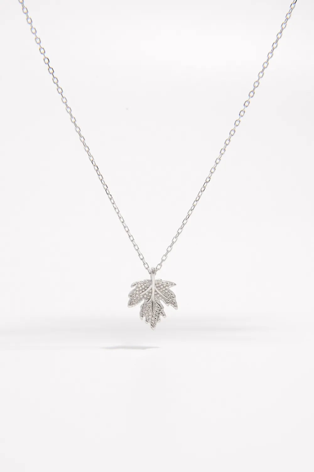 Sterling Silver Maple Leaf Necklace with intricate leaf design on a delicate chain