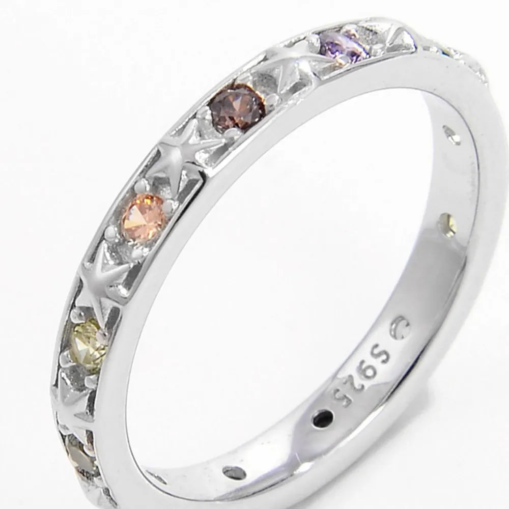 Trendsi sterling silver stacking ring adorned with colorful gems and star designs for elegant layering