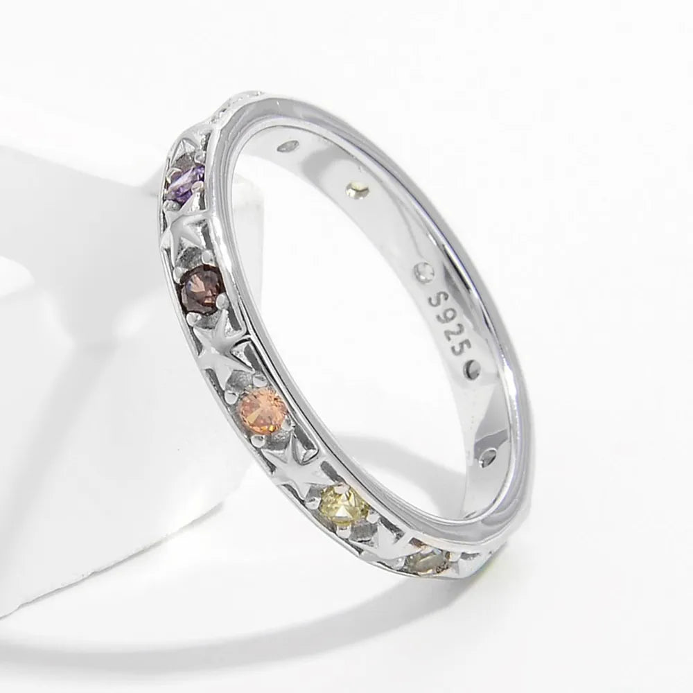 Trendy sterling silver stacking ring with colorful gemstones and a stylish design
